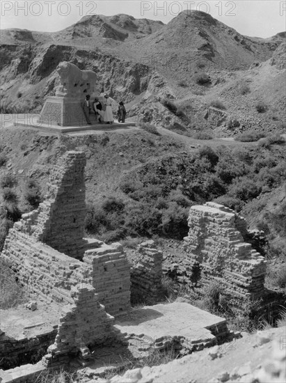Ruins of Babylon the great in Iraq, views of crumbling ruins. Basalt lion. Marking Daniel's den ca. 1932