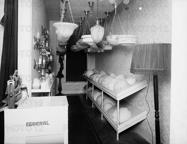 Various chandeliers on display ca.  between 1910 and 1935