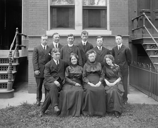 Father Fealey & family group photo ca. between 1910 and 1935