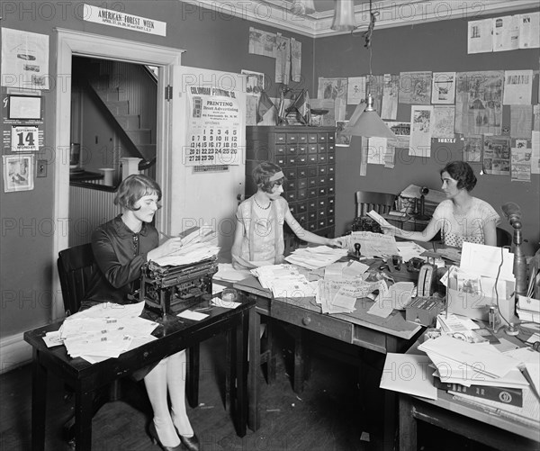 Three women working in the offices of the American Nature Association ca. between 1910 and 1926