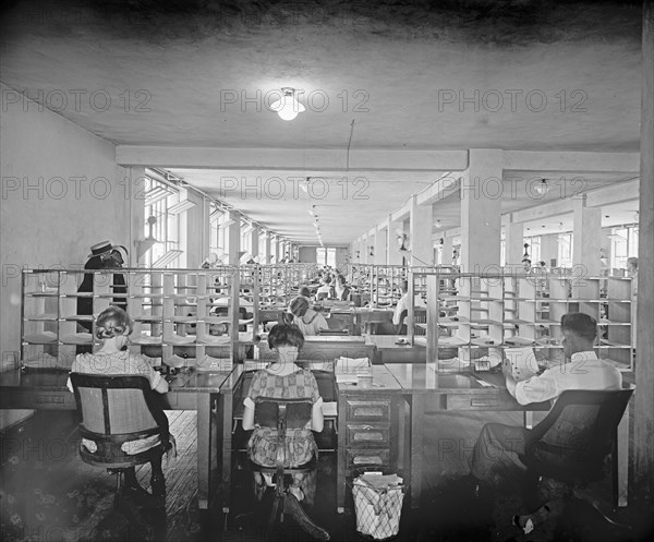 Workers processing soldier's bonus ca.  between 1910 and 1935