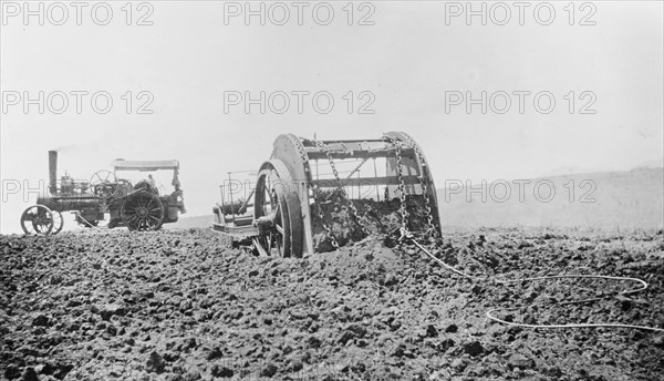 Tractor in a field in the Hawaiian Islands ca.  between 1910 and 1920