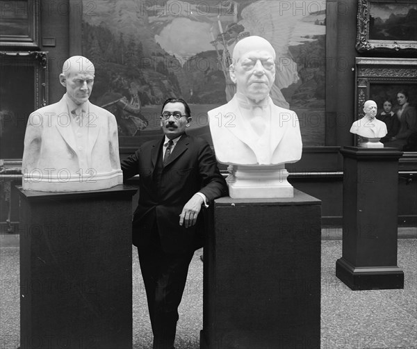 Moses Dykaar with busts of Presidents at National Gallery, [Washington, D.C.] ca.  between 1910 and 1926