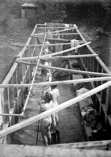 National Guard troops showering in the bath house, view from above; Gettysburg, PA ca.  1910