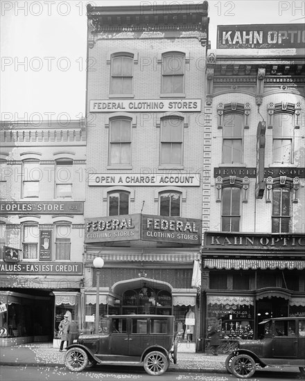 Cars parked in front of the Federal Clothing Store, 621 7th St., N.W., [Washington, D.C.] ca.  between 1910 and 1926