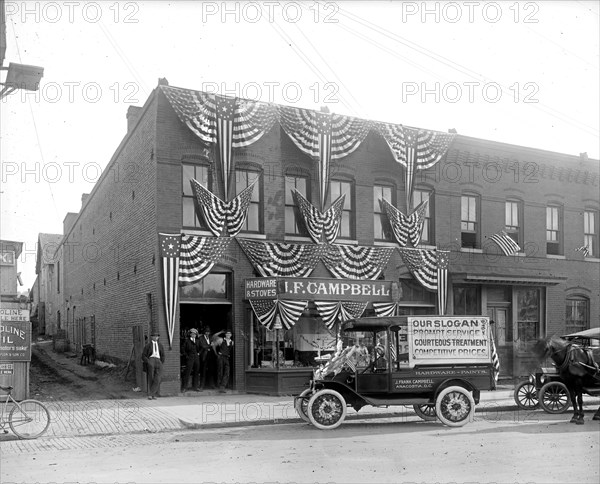 J.F. Campbell Hardware & Stoves, Anacostia, D.C.; decorated with American flags and bunting ca.  between 1910 and 1920