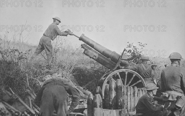 American 155 mm artillery cooperating with the 29th Div. in position on road just taken from the Germans. Battery A 324th artillery, 158th Brigade in France / Signal Corps ca.  1917