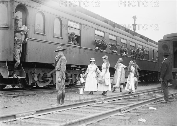 Red Cross workers near train ca. between 1909 and 1940