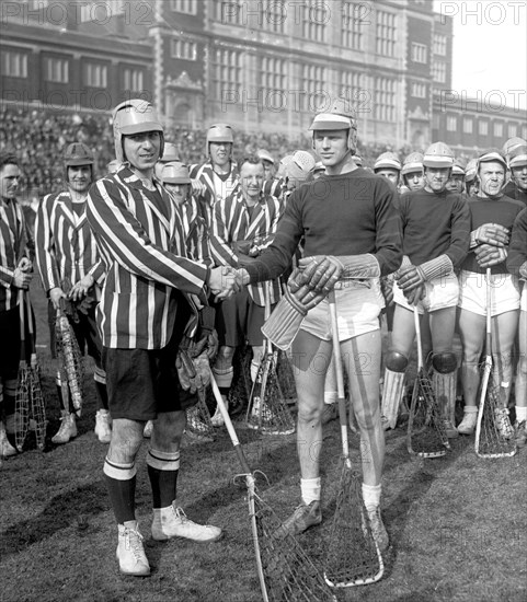Rival men's lacrosse players shaking hands ca. between 1909 and 1923