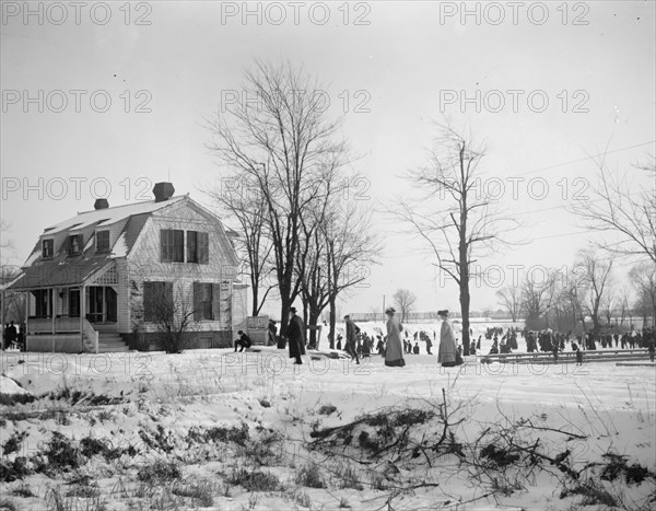 Skating on the basin on a cold winter day ca. between 1909 and 1923