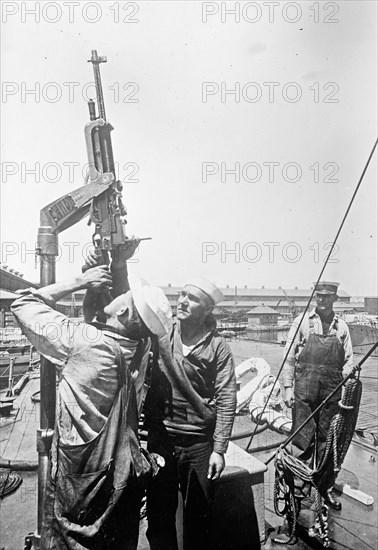 Sailor operating an auto aircraft gun on the U.S.S. Paulding ca. between 1909 and 1920