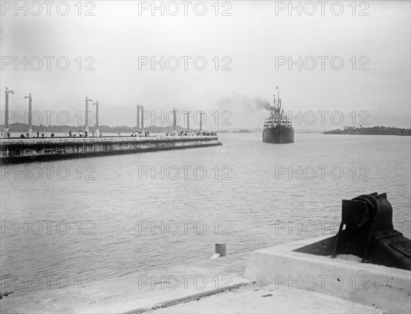 Steamer traversing the Panama Canal. Steamer steaming into Gatun Lock ca. between 1909 and 1919