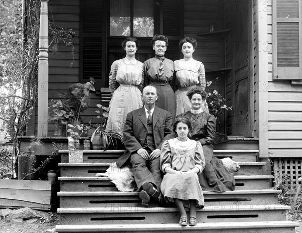 Family photo on the steps of a house in Vienna VA ca. between 1909 and 1923
