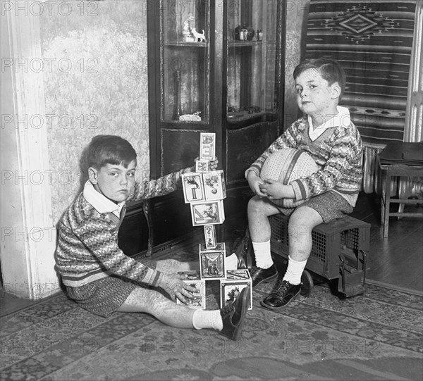Two boys playing with blocks ca. between 1909 and 1923