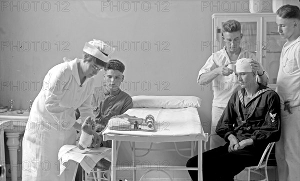 Nurse and patients at the Naval hospital ca. between 1909 and 1932