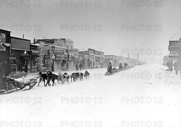 Dog team leaving Anchorage, Alaska; these teams carried $265,000 in gold  ca. between 1909 and 1920