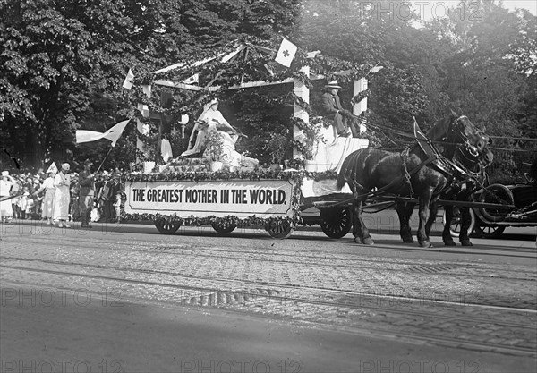 The Greatest Mother in the World float in a Red Cross parade ca.  May 1918