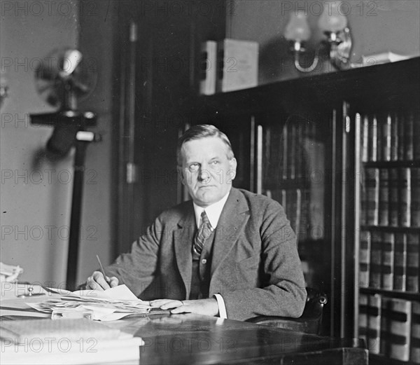 Senator Lenroot sitting at his desk ca.  between 1918 and 1920