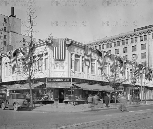 Aster Chinese Restaurant on second floor of a building and Whelan Drugstore on the first floor ca.  between 1918 and 1928