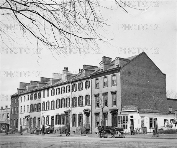 Horse with cart parked outside the A.E. Beitzell Oyster House ca. between 1918 and 1920