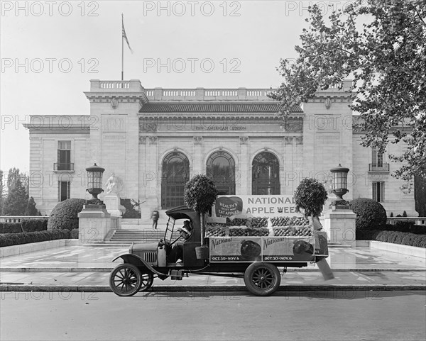National Apple Week Association float [Pan American Union, Washington, D.C. in background] ca.  between 1918 and 1928