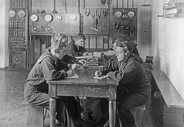 Naval training station, [Newport, R.I.], learning how to use a wireless telegraph ca. between 1909 and 1940