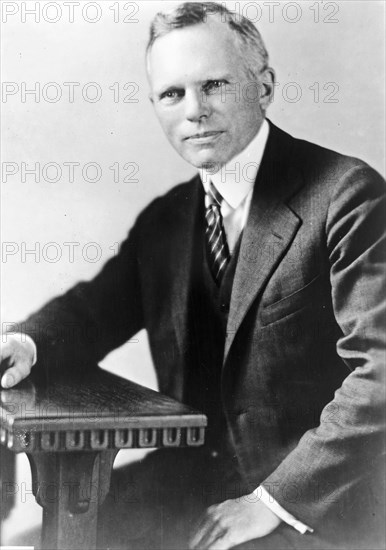 Frederick J. Libby, three-quarter length portrait, seated, facing slightly left ca. 1909