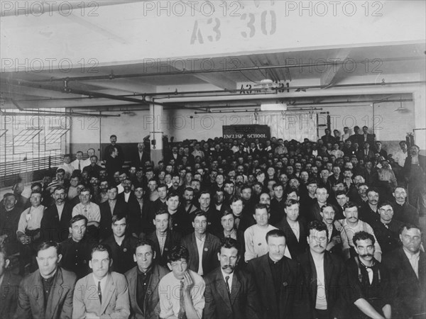 Immigrants in English class given by Training Service of the Department of Labor in Ford Motor Co. Factory, Detroit, Michigan ca. 1909