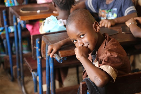 A smiling school student, a school boy, in Darsalam School in Bamako Mali ca. 10 May 2017