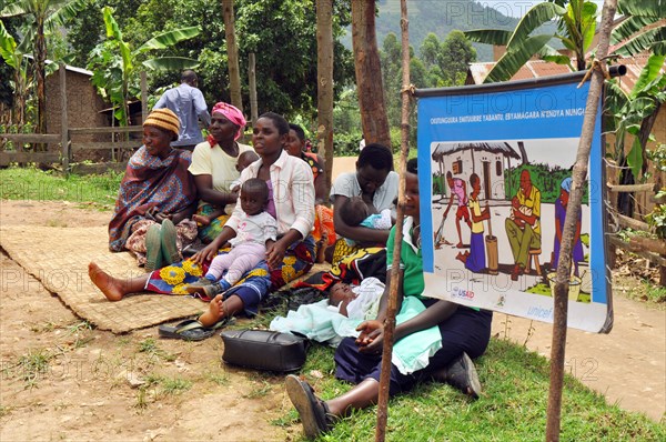 Women in the Bulambira community Uganda listen to a Family Life School community group meeting (Rubanda District) ca. 14 March 2018