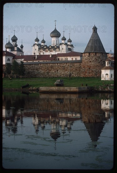 Monastery, Cathedral of the Transfiguration of the Savior (1558-1566), Church of St. Nicholas (1832-1834), (left), and Chapel of St. Peter (mid 19th century), southwest view across Bay of Felicity, Solovetskii Island, Russia; 1999