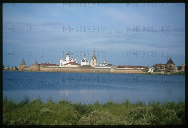 Monastery of the Transfiguration of the Savior (16th-19th centuries), northeast view across Holy Lake, with White Tower (left), Arkhangelsk Tower, and St. Nicholas Tower (right), Solovetskii Island, Russia; 1998