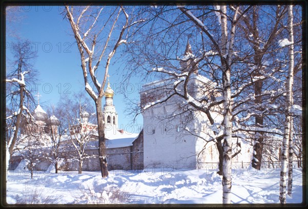 North and west walls of Archbishop's Court (Kremlin), with northwest tower (1671-75), and St. Sophia Cathedral belltower (1869-70), Vologda, Russia 2000.