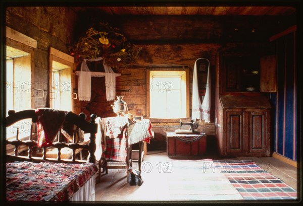 Igoshev house, from village of Gribany (mid-19th century), interior, main room, Khokhlovka, Russia 1999.