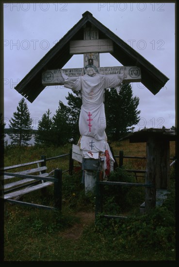 Votive cross (1886), with Mezen River in background, Kimzha, Russia; 2000