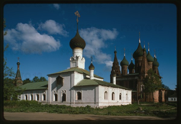 Church of the Tikhvin Icon of the Mother of God (1686-1690s), southeast view, whose red brick walls have been repainted white in a recent restoration, with Church of Saint Nicholas Mokryi (1665-72), in background, Yaroslavl', Russia 1996.