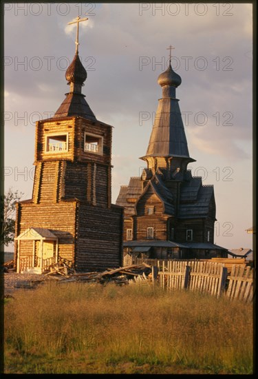 Bell tower (2001), with Church of Dormition (1674), Varzuga, Russia; 2001