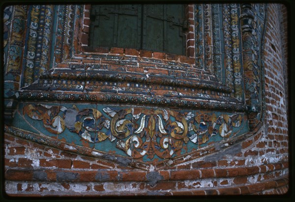 Church of Saint John Chrysostome in Korovniki (1649-54), east facade, detail of decorative ceramic window surround, Yaroslavl', Russia; 1987