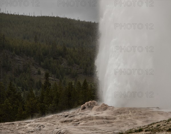Close up of water erupting from geyser cone. Old Faithful Geyser in Yellowstone National Park; Date: 13 June 2017