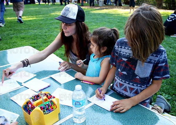 Ojai, Calif. (March 18, 2017) - Visitors color seed packets to hold native pollinator seeds during an event at the Libbey Bowl celebrating women in science