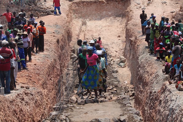 Workers build a dam in Binga, Zimbabwe  ca. 14 October 2015