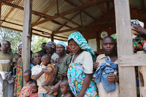 Women and children await help from relief workers in North Kivu Cote d’Ivoire (Ivory Coast) ca. 22 March 2017