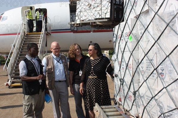 A USAID transport carrying 67 tons of humanitarian supplies arrives from Nairobi to South SudanA group headed by U.S. Ambassador to South Sudan, Susan Page, (far right) meet the emergency aid shipment as it arrives in Juba ca. 4 February 2014