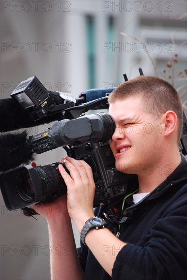 News cameraman at a Tea Party rally in Dallas, TX (one of the first in the United States on Feb. 26 2009)