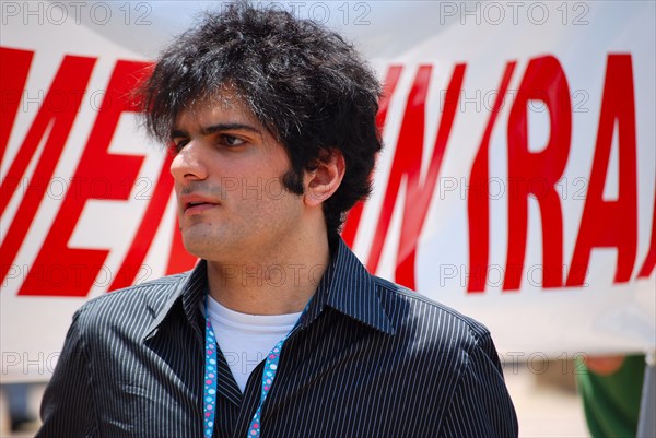 Iranians in Texas taking part in a Freedom for Iran / Green Revolution rally at Dallas City Hall plaza in downtown Dallas, TX ca. June 2009