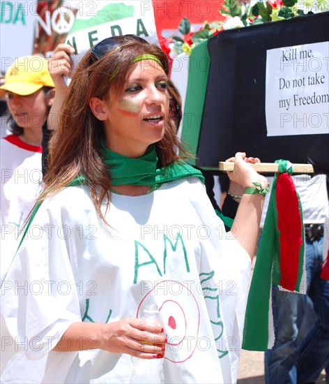 Iranians in Texas taking part in a Freedom for Iran / Green Revolution rally at Dallas City Hall plaza in downtown Dallas, TX ca. June 2009