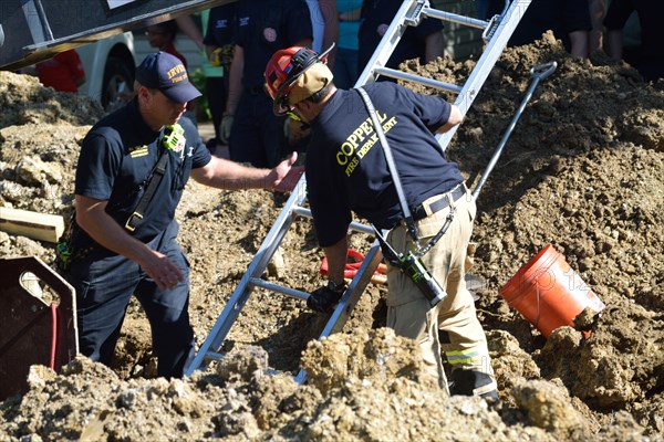 Rescuers Help Trapped Construction Worker, Irving, TX USA