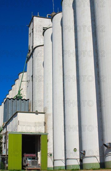 Large grain elevator complex in a small town in Western Kansas