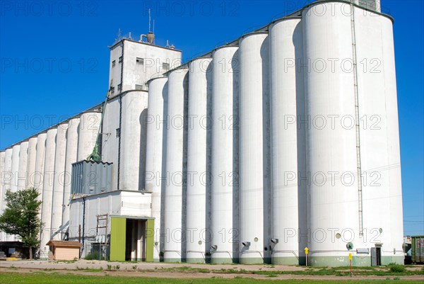 Large grain elevator complex in a small town in Western Kansas