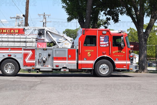 A fire engine, Ladder # 5, parked outside the Duncan Oklahoama fire department